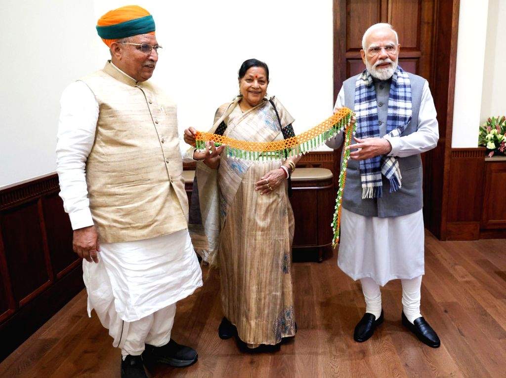 Shri Arjun Ram Meghwal with the Prime Minister of India, Shri Narendra Modi, at an official occasion.